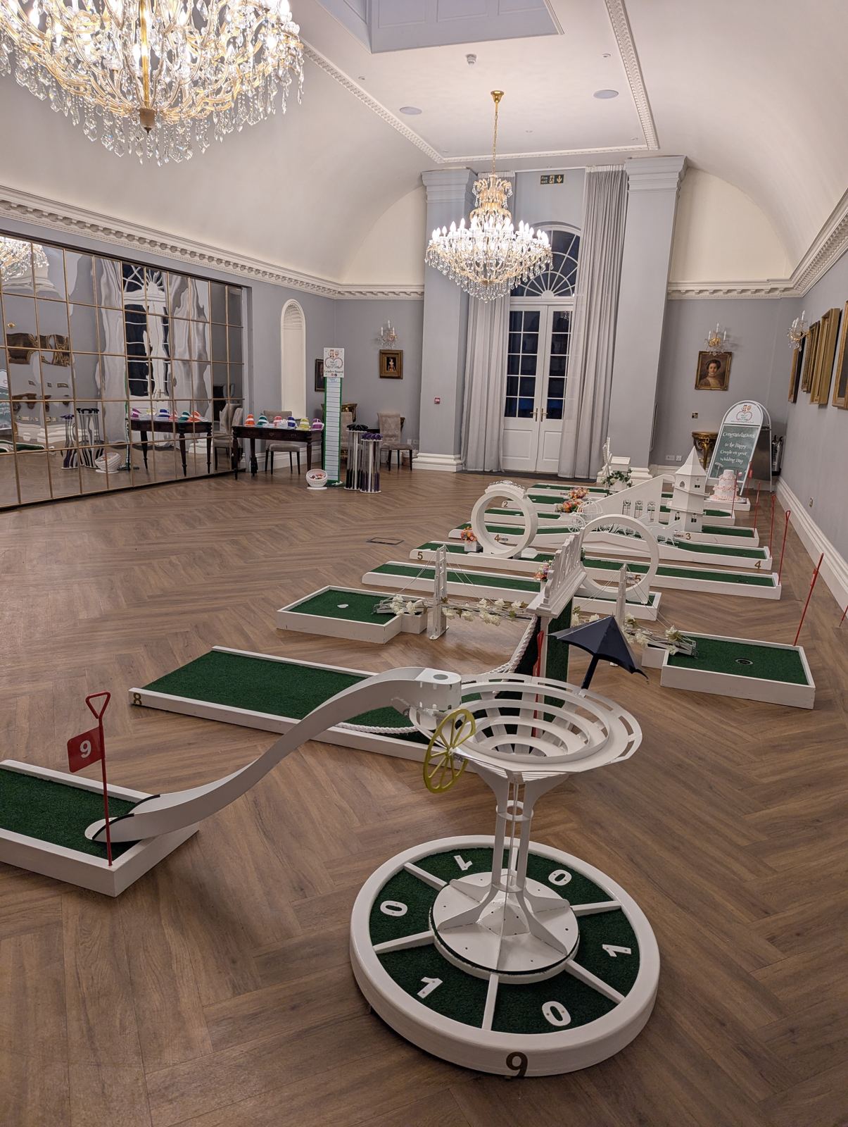 The course set up indoors under the chandeliers at Rushton Hall